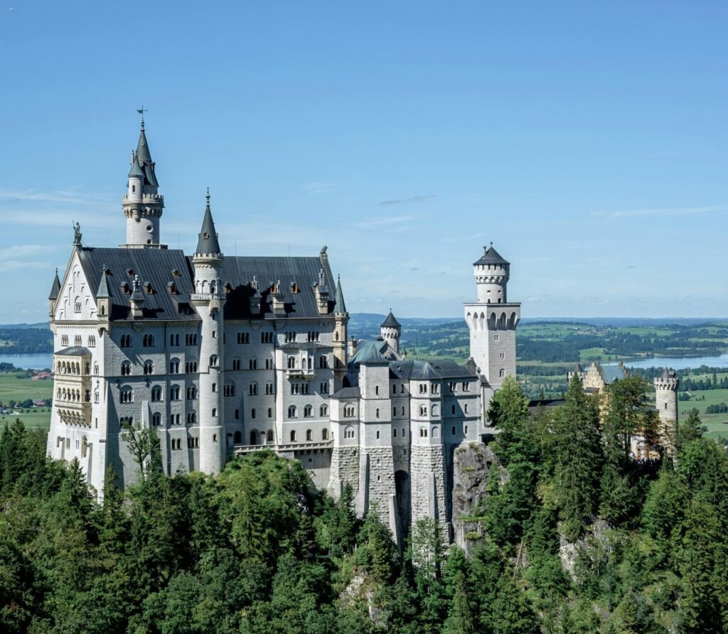 Discover the iconic Neuschwanstein Castle nestled in the scenic Bavarian hills.